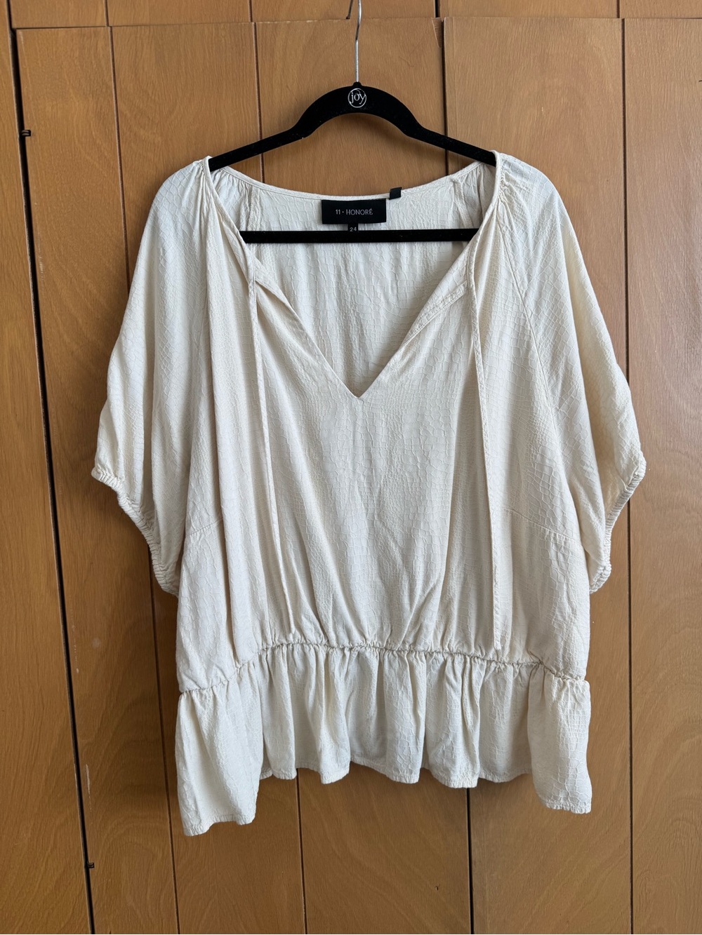 Cream V-Neck Peplum Top